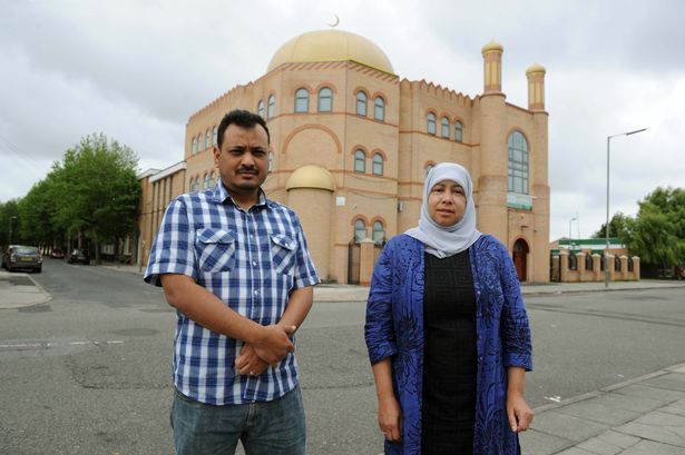 Mohamed Mansur and Rahma Sani outside the Mosque