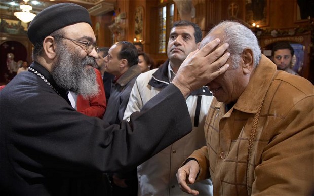 EGYPT Coptic Orthodox Christian's at the saint Bishoi church in Port Said, famous for it's icon of Mary which oozes a holy oil