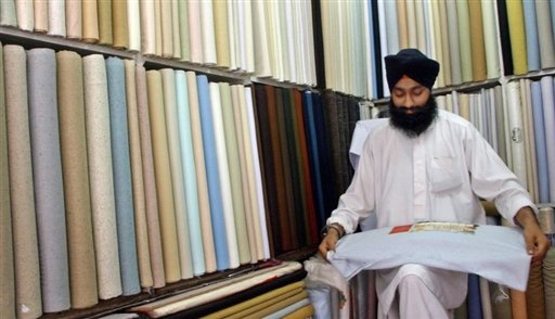 [A+Sikh+businessman+in+his+shop+in+Peshawar.jpg]