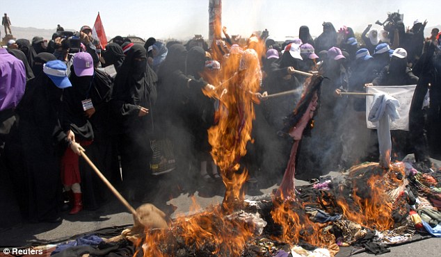 Symbolic burning: The protest is a Bedouin tradition which call for help from the tribesmen as violence rages all around them