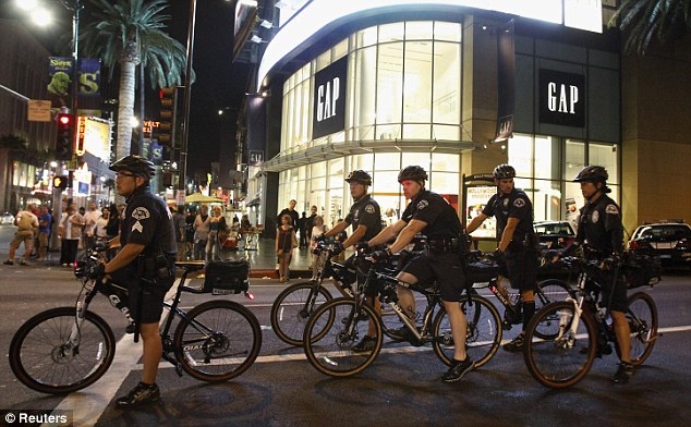 Officers on bikes were also called on to quell the trouble in Hollywood last night