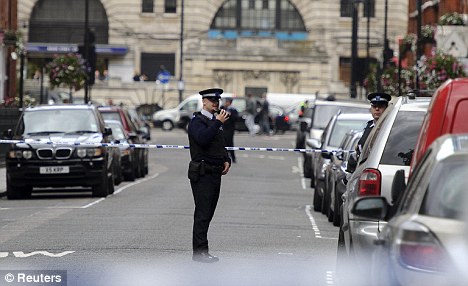 Security: The Westminster road where the depot is located was cordoned off after the police raid