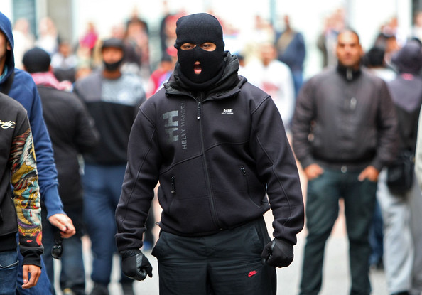 Anti-right wing youths taunt members of the English Defence League during a rally on September 5, 2009 in Birmingham, England. The English Defence League (EDL) are holding their demonstration in various locations around the city with minor scuffles amongst Saturday shoppers