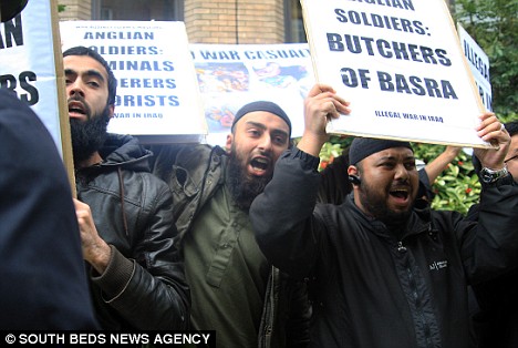 Contempt: Muslim protesters at Tuesday's parade in Luton